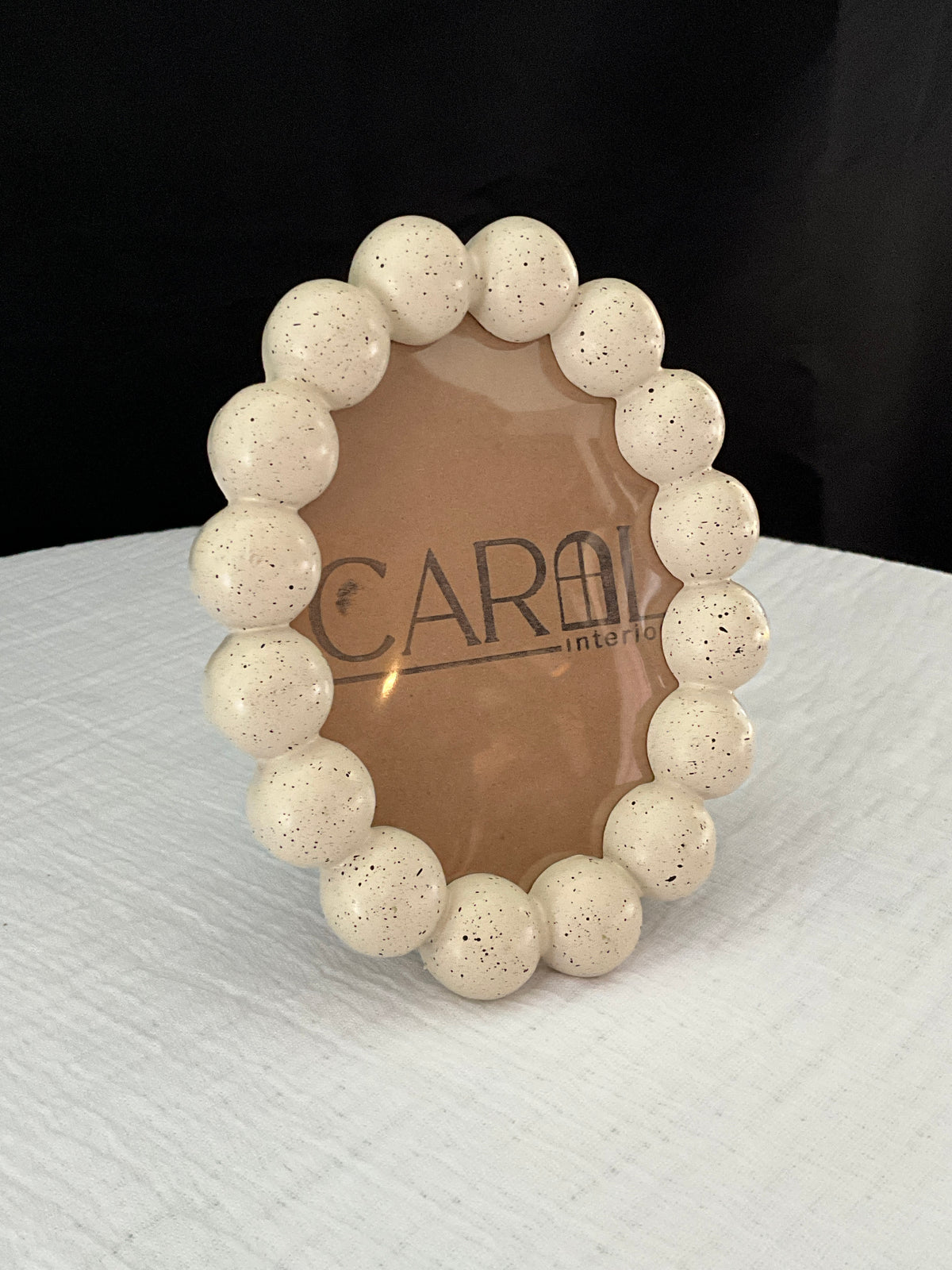 Retratera pequeña de madera