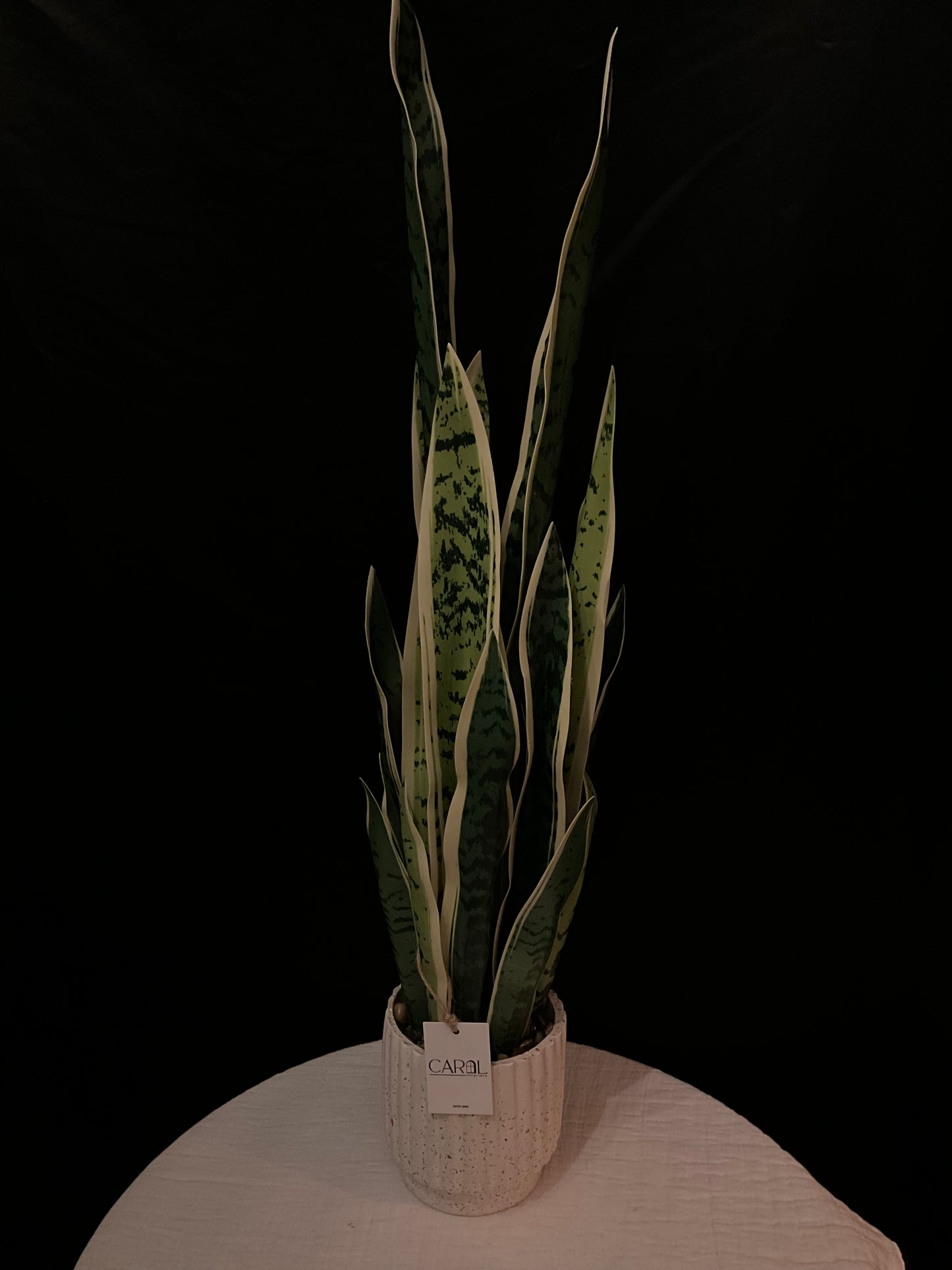Planta artificial con macetero